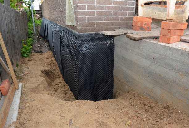 Happy homeowners after waterproofing job in Woodbury Heights